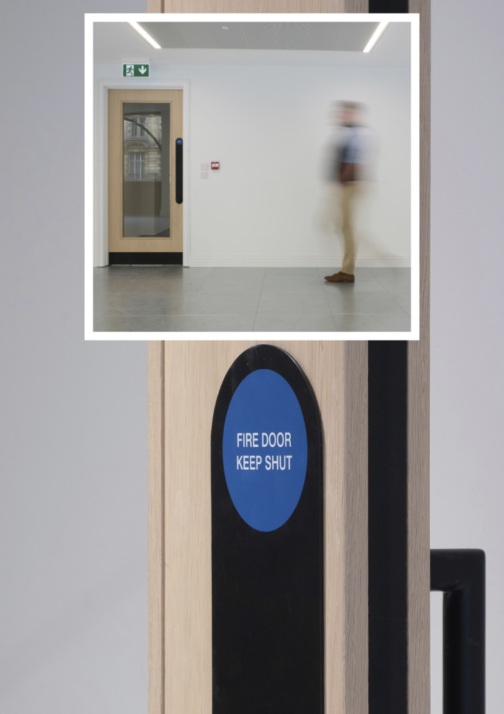 Image of fire door at Southampton Row with insulation strip in door and label of 'fire door keep shut' on the outside on a pushplate with a pull handle on the inside. 
